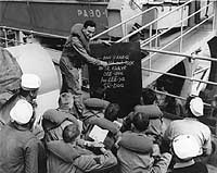 Photo # 80-G-86311: Servicemen on USS James O'Hara learning Arabic before arriving in North Africa, June 1943.