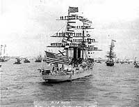Photo # NH 416:  USS Boston dressed with flags and manning her yards, 29 April 1889