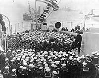 Photo # NH 1836:  President Theodore Roosevelt addresses officers and crewmen on board USS Connecticut, February 1908