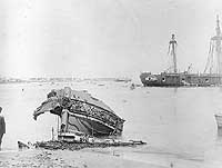 Photo # NH 2148:  Shattered bow of the German gunboat Eber on the beach at Apia, Samoa, after the 15-16 March 1889 hurricane