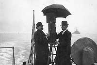 Photo # NH 41695:  Photographers at work during the Great White Fleet's return to Hampton Roads, Virginia, 22 February 1909