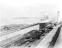 Photo #  NH 51335:  S.S. Leviathan entering drydock at Boston, during the 1920s