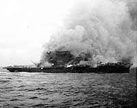 Photo # NH 51382:  USS Lexington burning and sinking after her crew abandoned ship, 8 May 1942