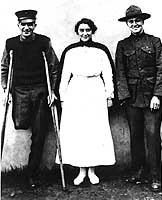 Photo # NH 52959: Navy Nurse with two convalescing Marines, during World War I