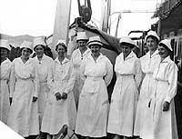 Photo # NH 53047:  Some of USS Relief's nursing staff, March 1921.