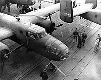 Photo # NH 53296: Army B-25 bombers parked on USS Hornet's flight deck, while en route to Japanese waters, April 1942
