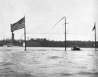 Photo # NH 63088:  USS Holland partially submerged, summer 1901