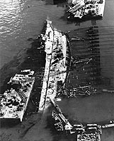 Photo # NH 64301:  USS Utah under salvage at Pearl Harbor, 13 February 1944.