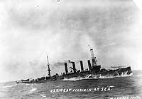 Photo # NH 83128:  USS West Virginia steaming through heavy seas, circa 1916.