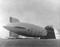 Photo # NH 85748: USS Macon leaving the airship hangar at Moffett Field, California, 26 October 1933