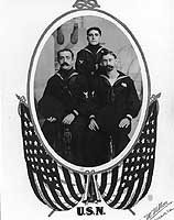 Photo # NH 86335:  Three members of USS Vicksburg's crew, circa the early 1900s