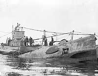 Photo # NH 93419:  USS R-6 being refloated in San Pedro Harbor, 13 October 1921