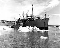 Photo # NH 97108:  USNS General A.W. Greely amid the ice at Thule, Greenland, July 1951.  USS LSM-397 is alongside.