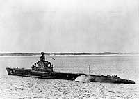 Photo # NH 98380:  USS Snook operating near shore, circa 1943
