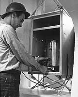 Photo # NH 98889:  Shock mounted coffee maker on board USS Atlanta, 1964