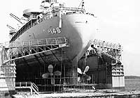 Photo # NH 99063:  USS Ponchatoula in the floating drydock USS Richland, during the 1970s