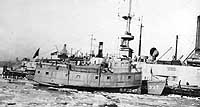 Photo # NH 100873:  USS Commander in an icy harbor, 31 December 1917.