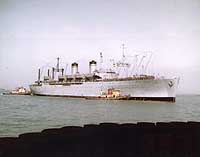 Photo # NH 103346-KN:  USNS General Maurice Rose assisted by tugs during the 1960s.
