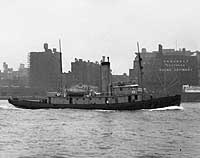 Photo # NH 104605:  U.S. Navy tug Penobscot underway, circa the later 1930s