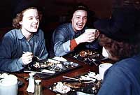 Photo # 80-G-K-14976:  WAVES trainees at 'chow', Norman, Oklahoma, 1943