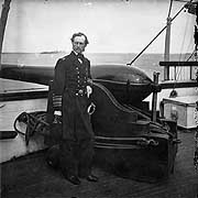 Photo # LC-B8171-3417:  RAdm. J.A. Dahlgren stands beside a gun on board USS Pawnee