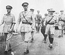 The Duke of Aosta <i>(centre)</i> accompanied by Major-General A. G. O. M. Mayne, Commanding 5th Indian Division, comes down from Amba Alagi after its surrender.