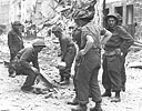 British Troops clearing away rubble in Caen, 9 July