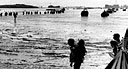 MEN WADING ASHORE AT GUAM