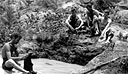 Men washing behind the defensive line after a long hard trek