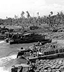 UNLOADING AT A BEACH ON LEYTE, 21 October 1944