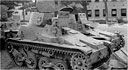 U.S. soldiers in a light Japanese tank at a collecting point