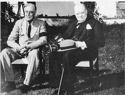 PRESIDENT ROOSEVELT TALKING WITH PRIME MINISTER WINSTON CHURCHILL AS THEY SAT ON THE LAWN OF THE PRESIDENT'S VILLA AT CASABLANCA. WEEK OF JANUARY, 17, 1943