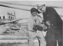 ONE OF THE U.S. COAST GUARD OFFICERS ASSISTING IN THE RESTORATION OF THE SICILIAN FISHING INDUSTRY