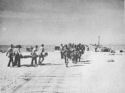 U.S. TROOPS MARCHING UP TO JOIN IN THE ATTACK ON THE GERMANS ON THE SALERNO SHORE