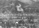 SHELLS BURST IN GERMAN HELD CASSINO, RAPIDO RIVER AREA, ITALY