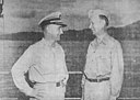 Rear Admiral ALBERT G. NOBLE, U.S. Navy (right), Chief of Staff, Seventh Amphibious Force and later second Commander, Amphibious Group Eight with Commodore RAY TARBUCK, U.S. Navy (left), his successor as Chief of Staff on the occasion of his detachment.