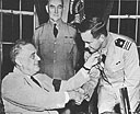 Lt. Comdr. John D. Bulkeley receives the Medal of Honor from President Franklin D. Roosevelt