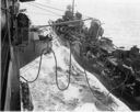 Fueling rig typical of that utilized by the large fleet carriers to refuel their escorts while under way. The second Yorktown (CV-10) refuels a Fletcher-class destroyer during the campaign to capture Okinawa. (National Archives)