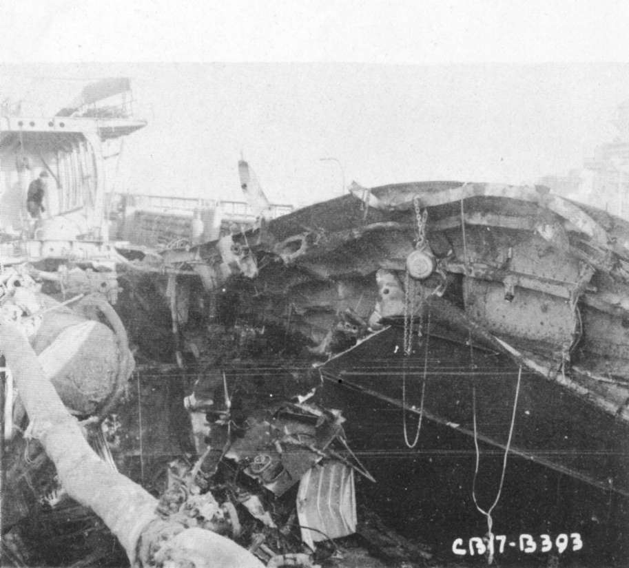 Photo 10: 9 February 1943 - View of damage to port-side main deck ...